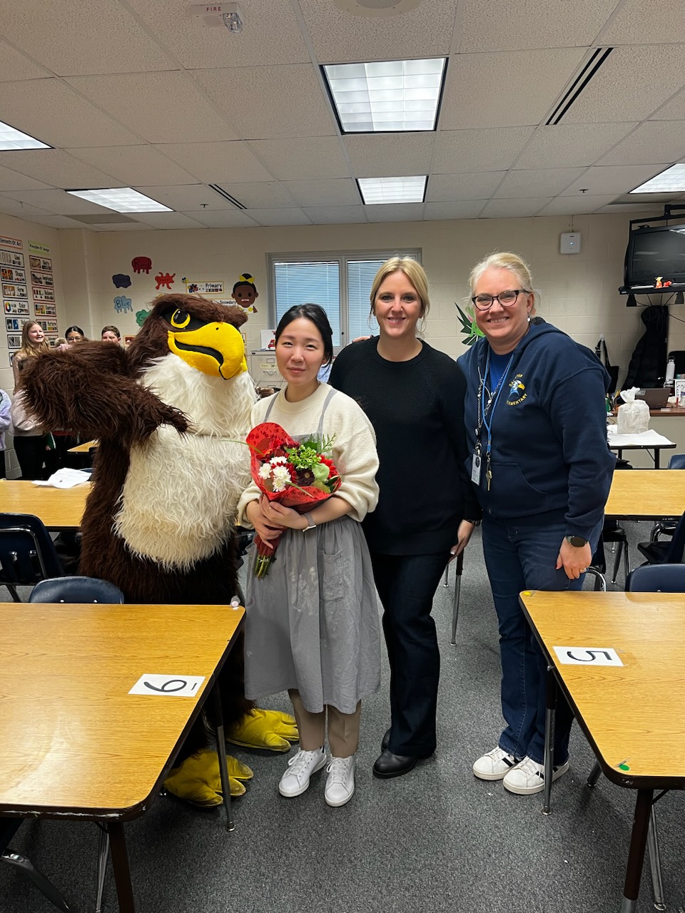 The Falcon, Ms. Sung, Ms. Jankovich, and Ms. Kleiber